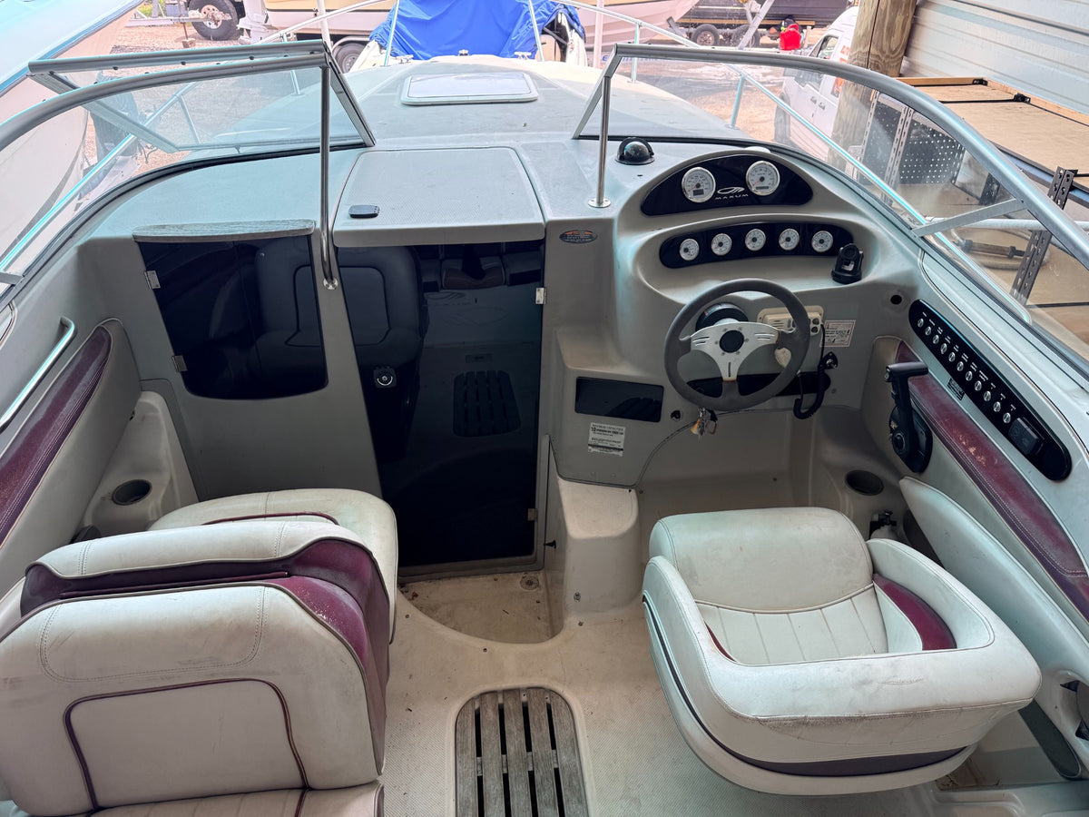 Maxum cockpit with custom acrylic cabin door and helm panels