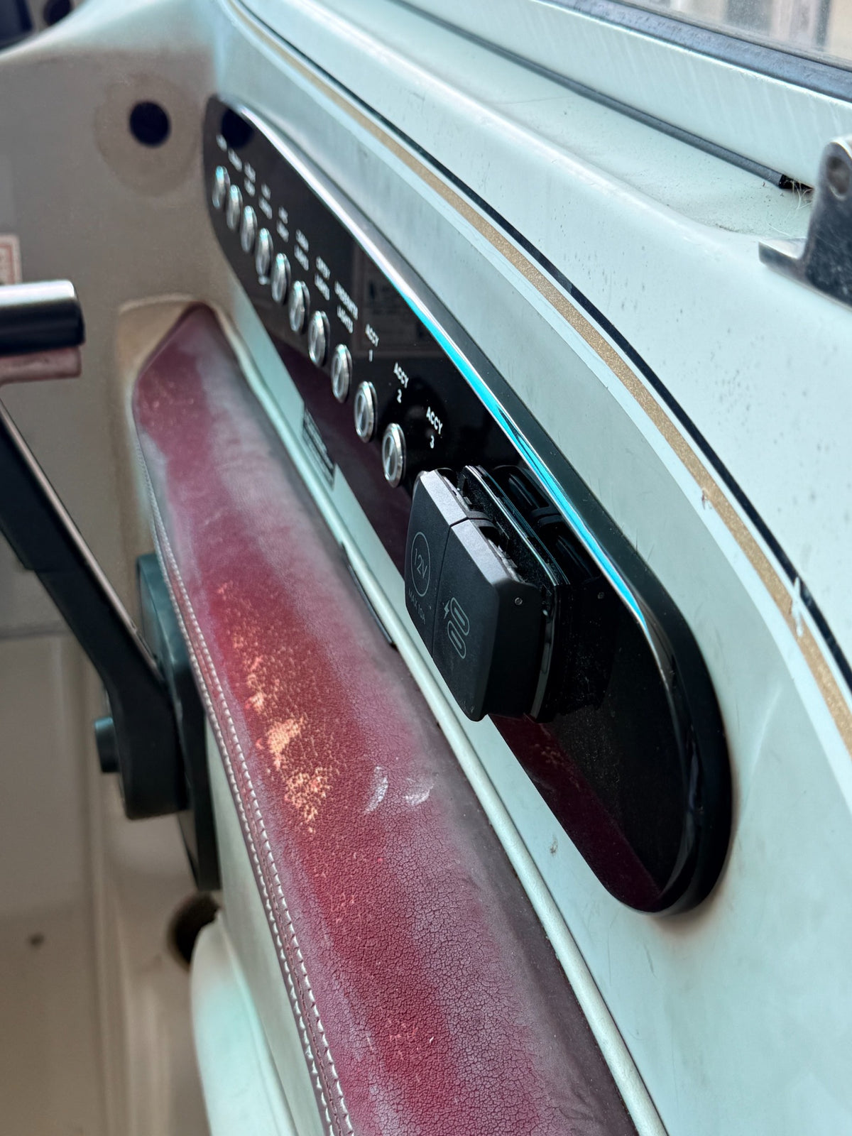 Custom glossy black acrylic marine push button and accessory panel